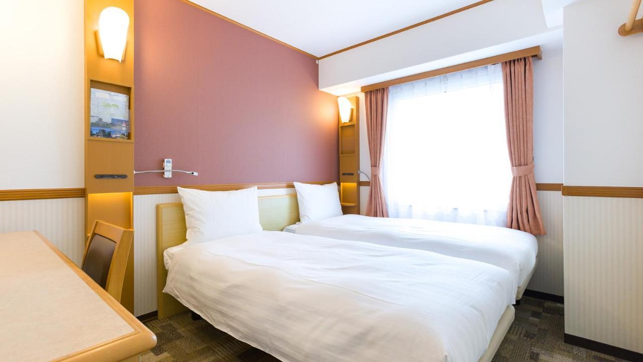 Toyoko Inn Tokyo Shinagawa-Eki Takanawa-Guchi Buitenkant foto