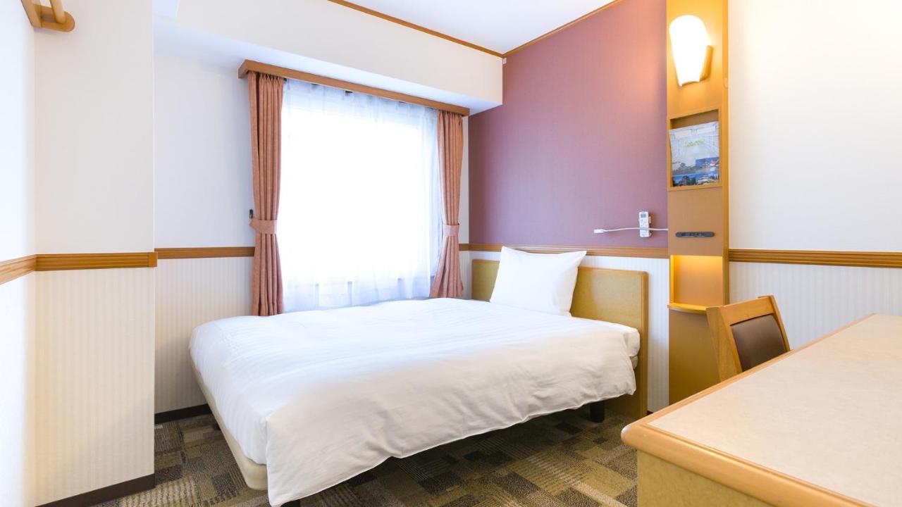 Toyoko Inn Tokyo Shinagawa-Eki Takanawa-Guchi Buitenkant foto