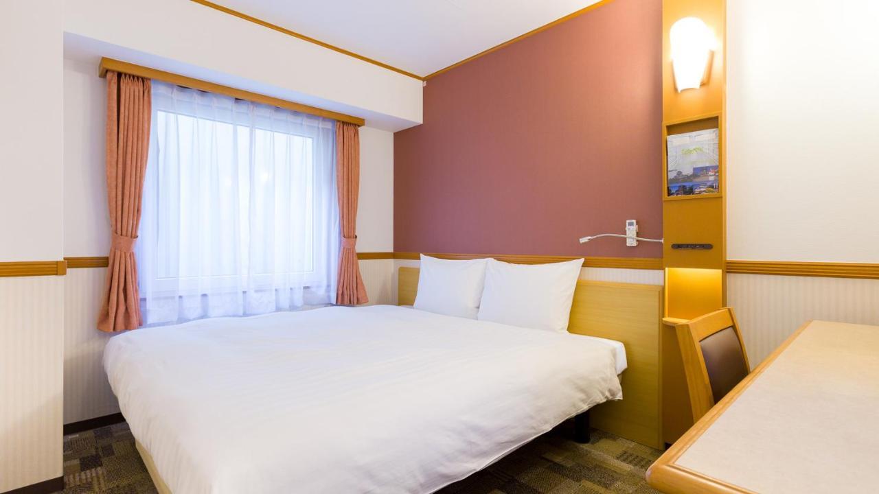Toyoko Inn Tokyo Shinagawa-Eki Takanawa-Guchi Buitenkant foto