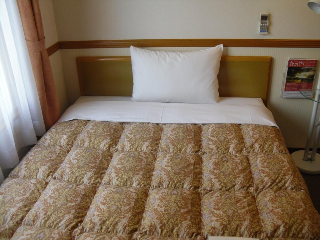 Toyoko Inn Tokyo Shinagawa-Eki Takanawa-Guchi Buitenkant foto
