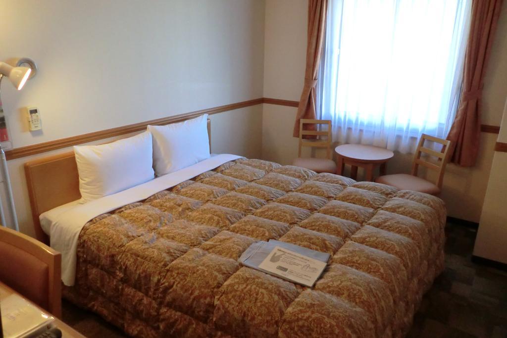 Toyoko Inn Tokyo Shinagawa-Eki Takanawa-Guchi Buitenkant foto